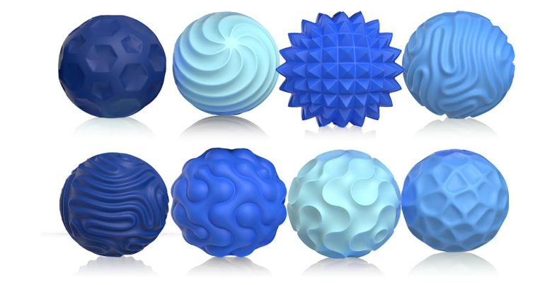 Set of 8 blue silicone sensory balls with various textures